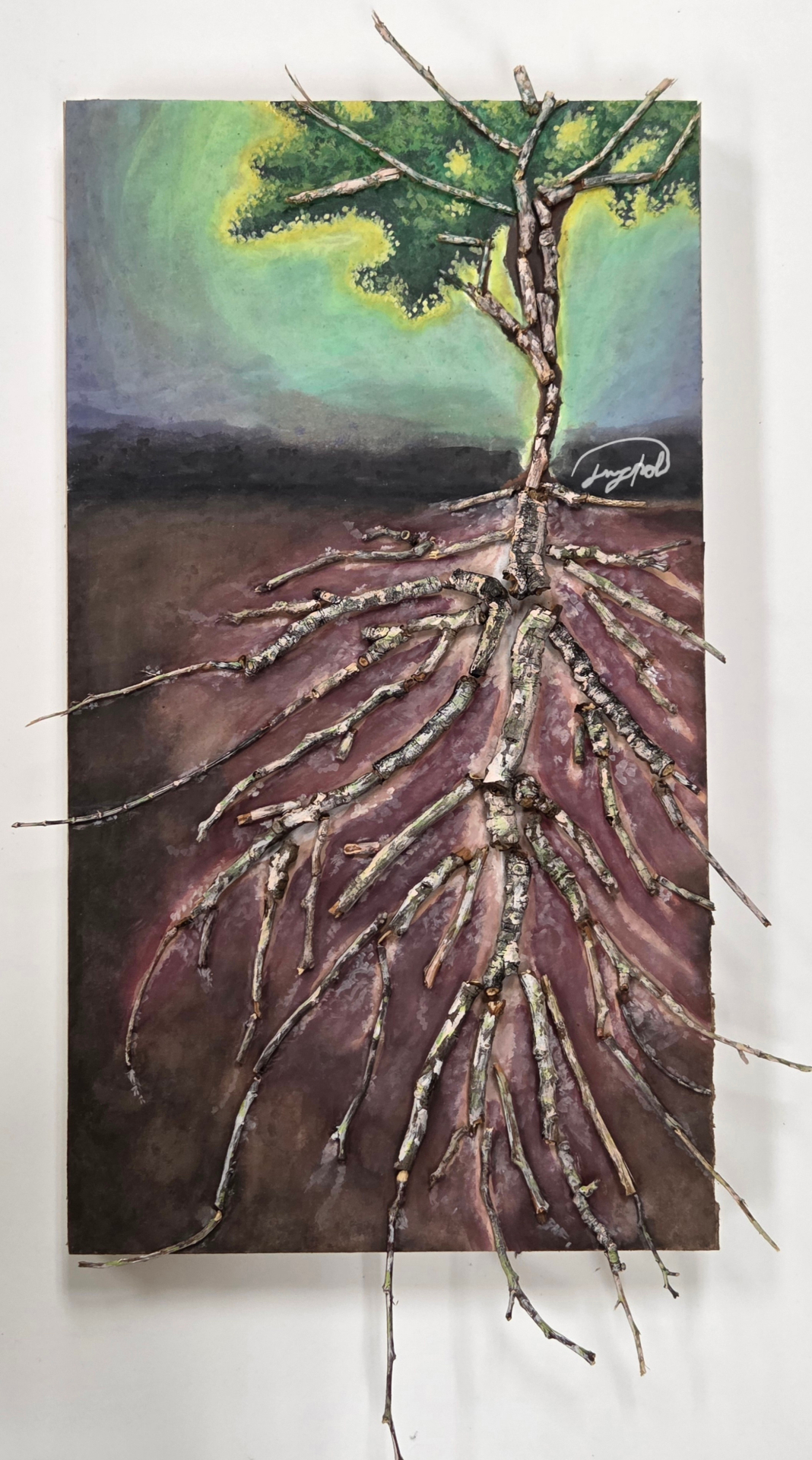 Mixed-media tree with real branches extending from the roots and canopy.